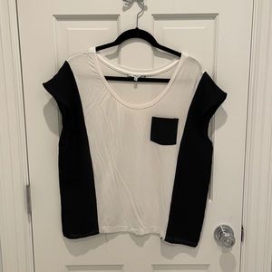 White and black colorblock tee with sheer panels